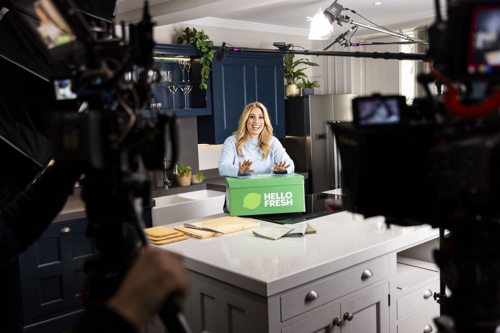 Behind the scenes of a Sunday Treat branded shoot with on-camera talent and a HelloFresh box