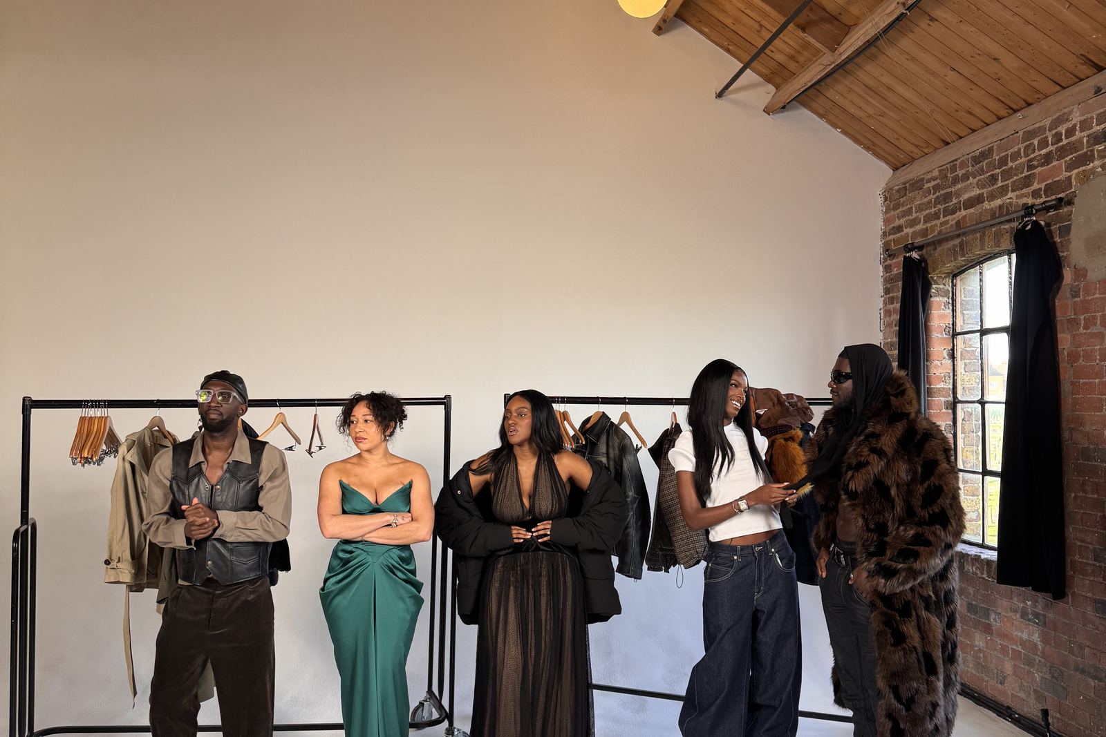Talent line-up on a Sunday Treat fashion brand shoot in a daylight studio