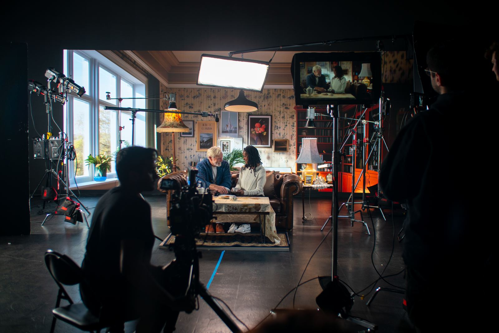 Sunday Treat crew filming a lit studio set for an agency production